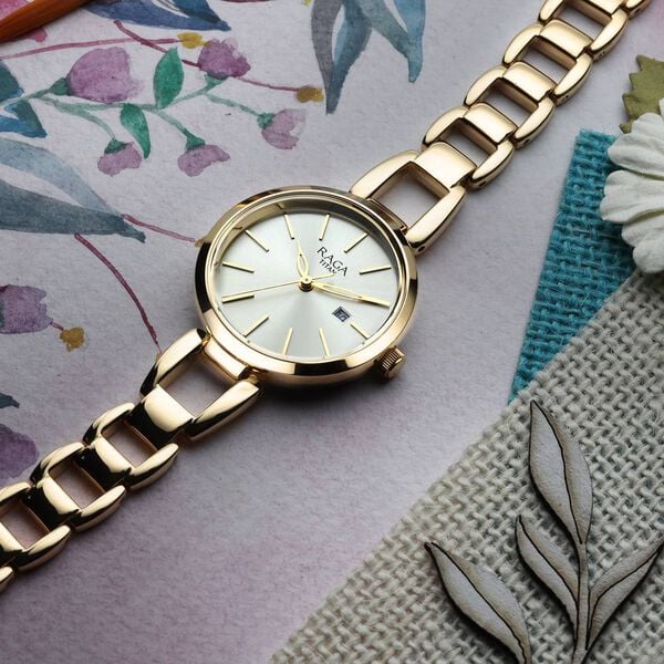 Titan Raga Viva Golden Dial Analog with Date Metal Strap Watch for Women NT2642YM01