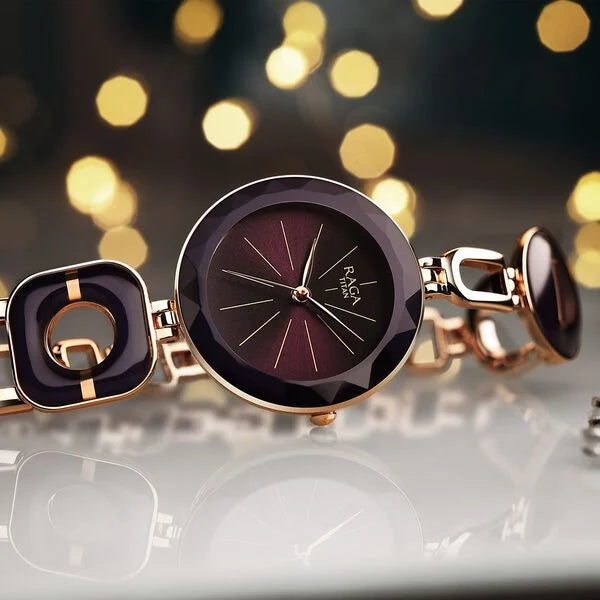 Titan Raga Delight Purple Dial Analog Metal Strap watch for Women NT95198WM01